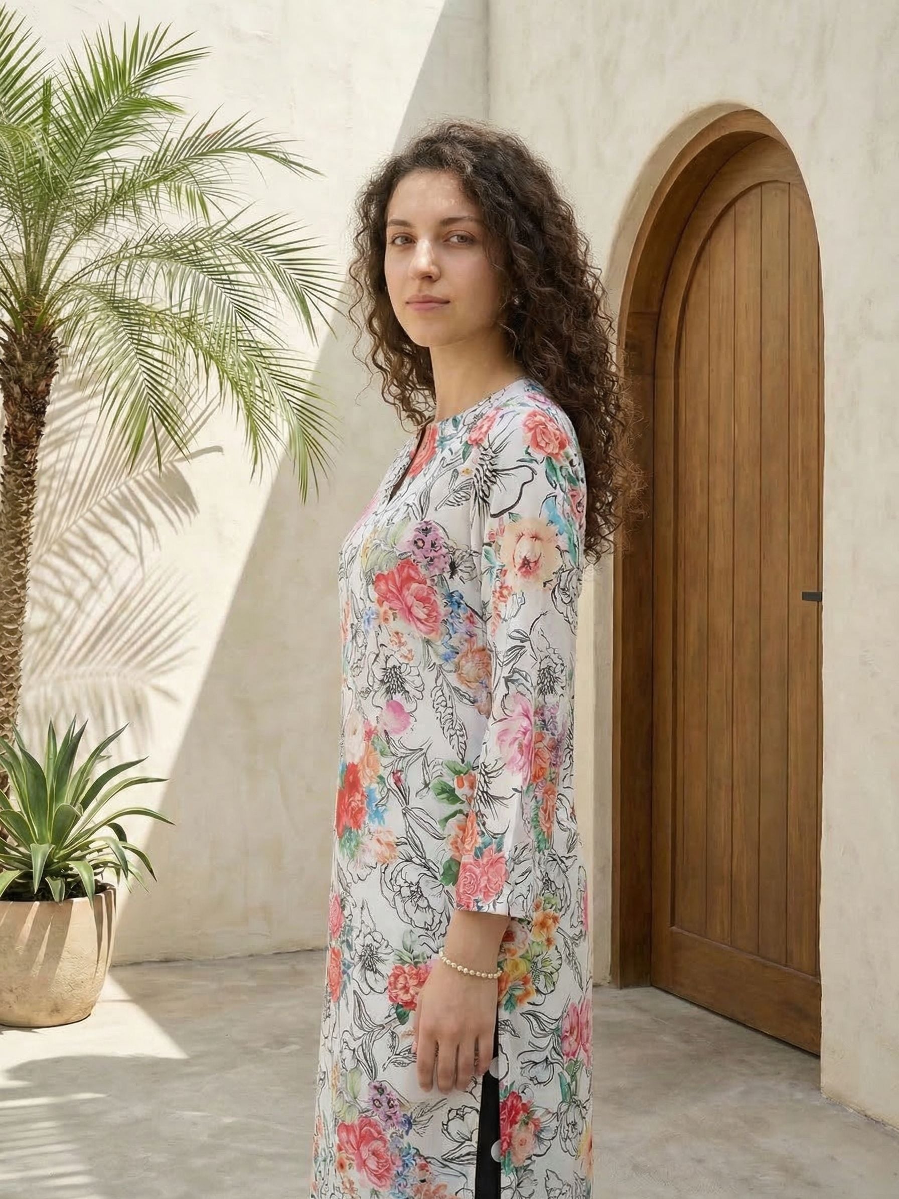 Women floral printed cotton kurta with trousers