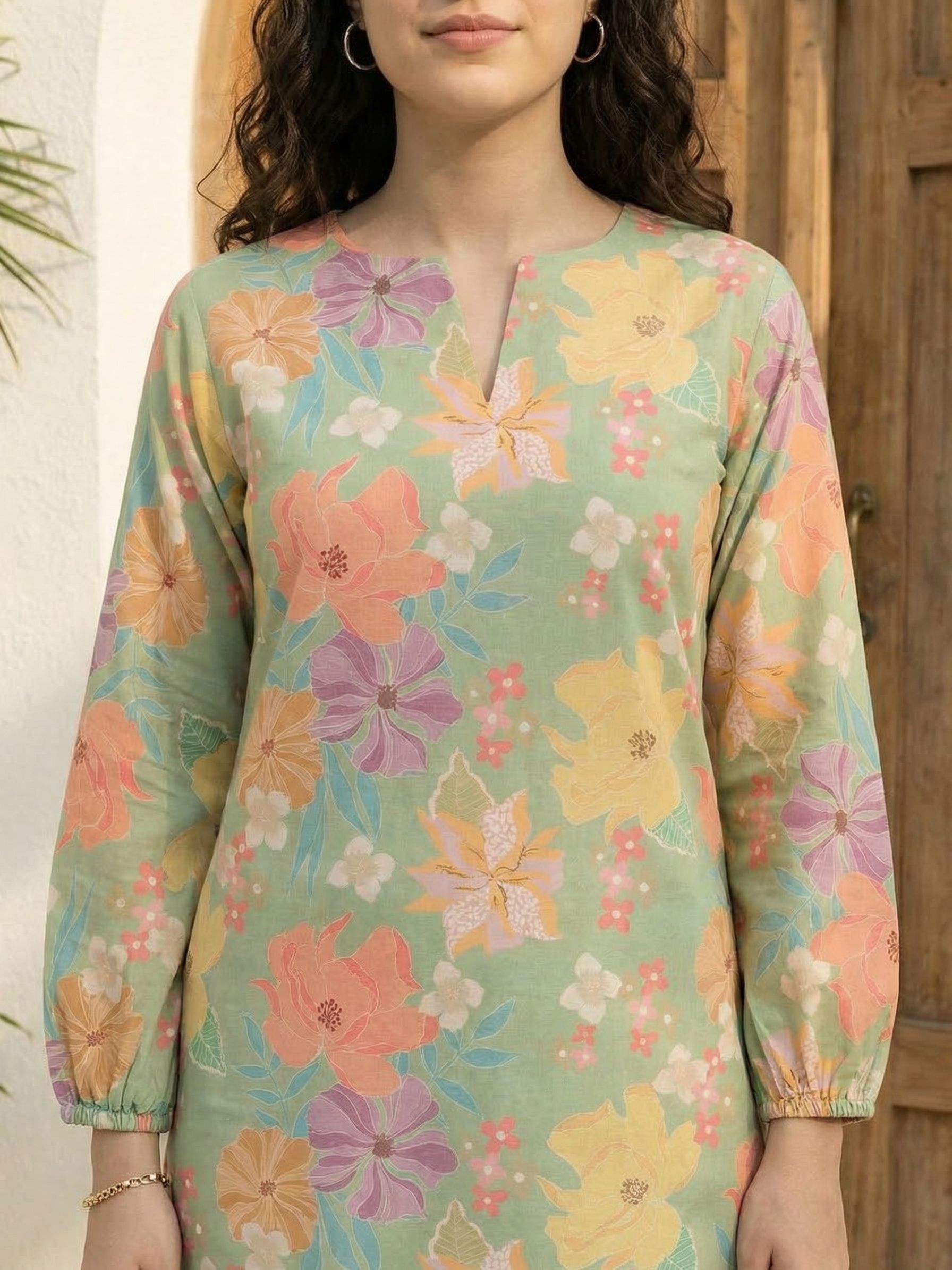 Women floral printed cotton kurta with trousers