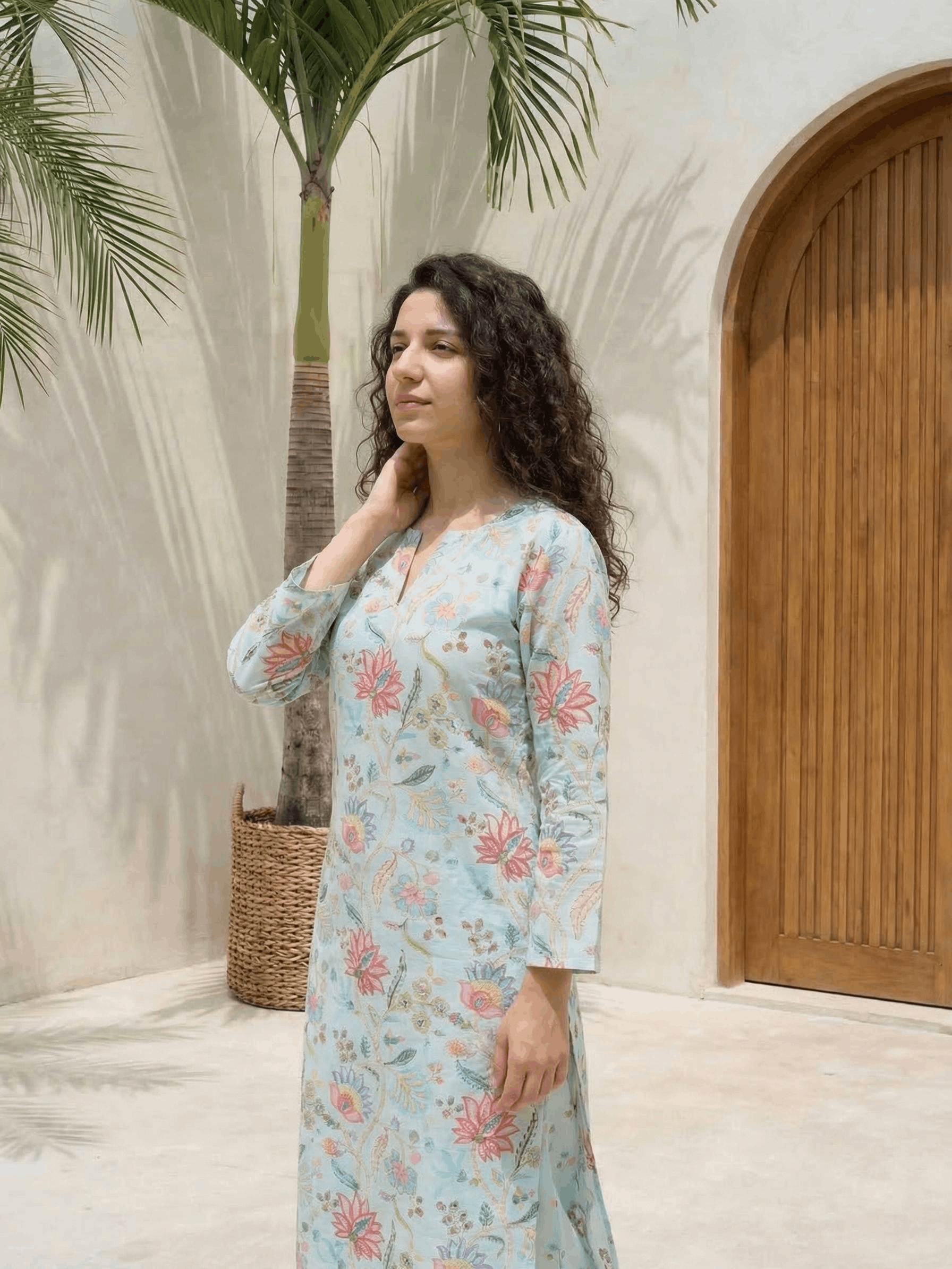 Women floral printed cotton kurta with trousers